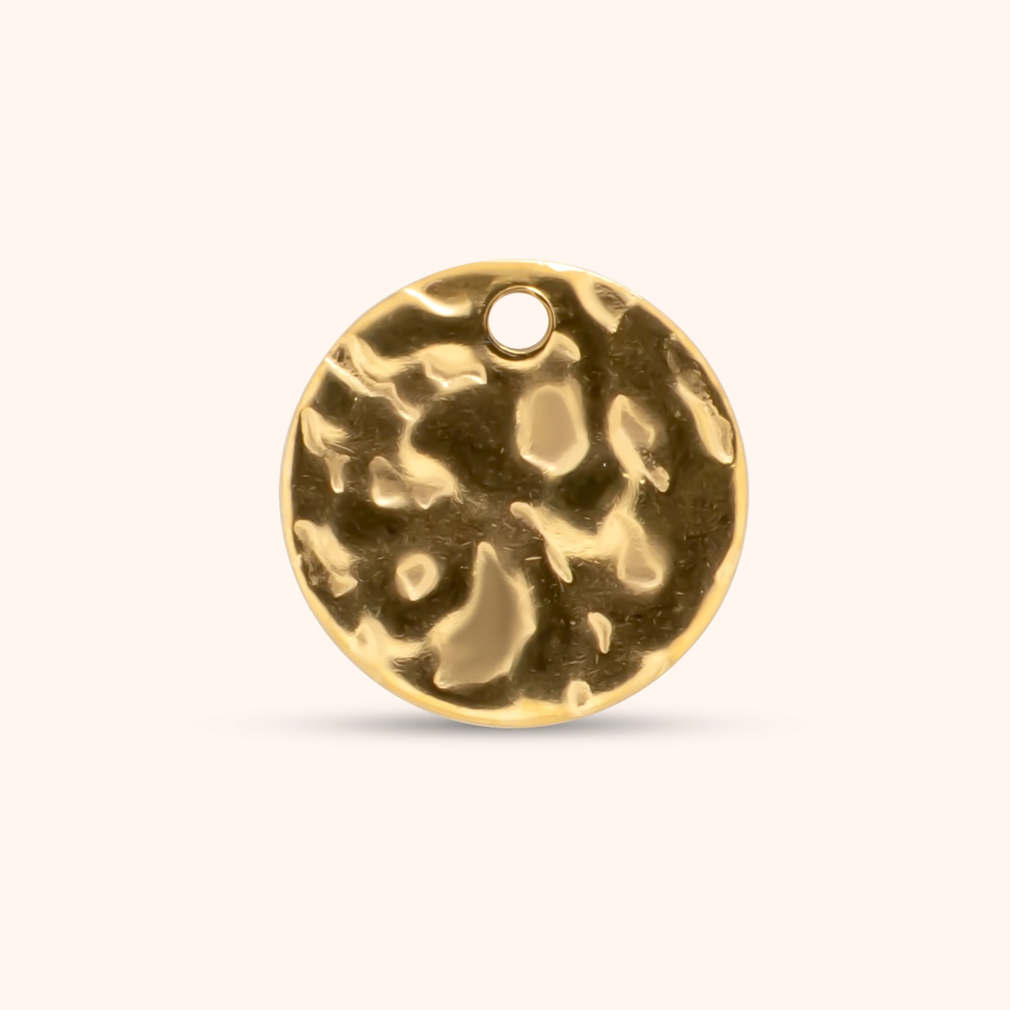 Round hammered gold charm with a small top hole, made of 18k gold plated stainless steel